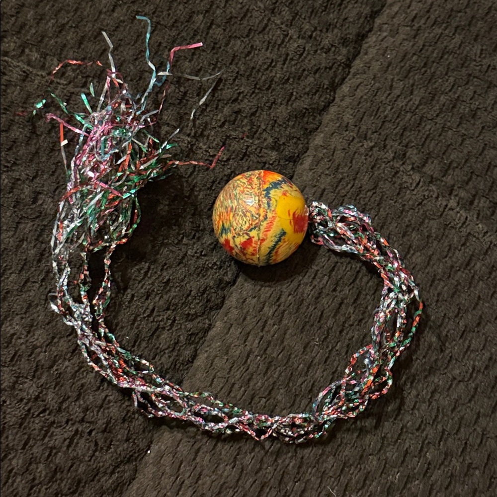 Vintage 1970s lMulti-colored Super Ball with Tinsel Tail Bouncy Ball Toy